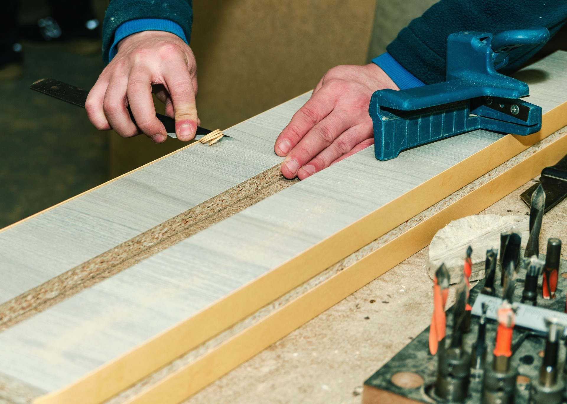 The carpenter processes the blanks for the manufacture of furniture